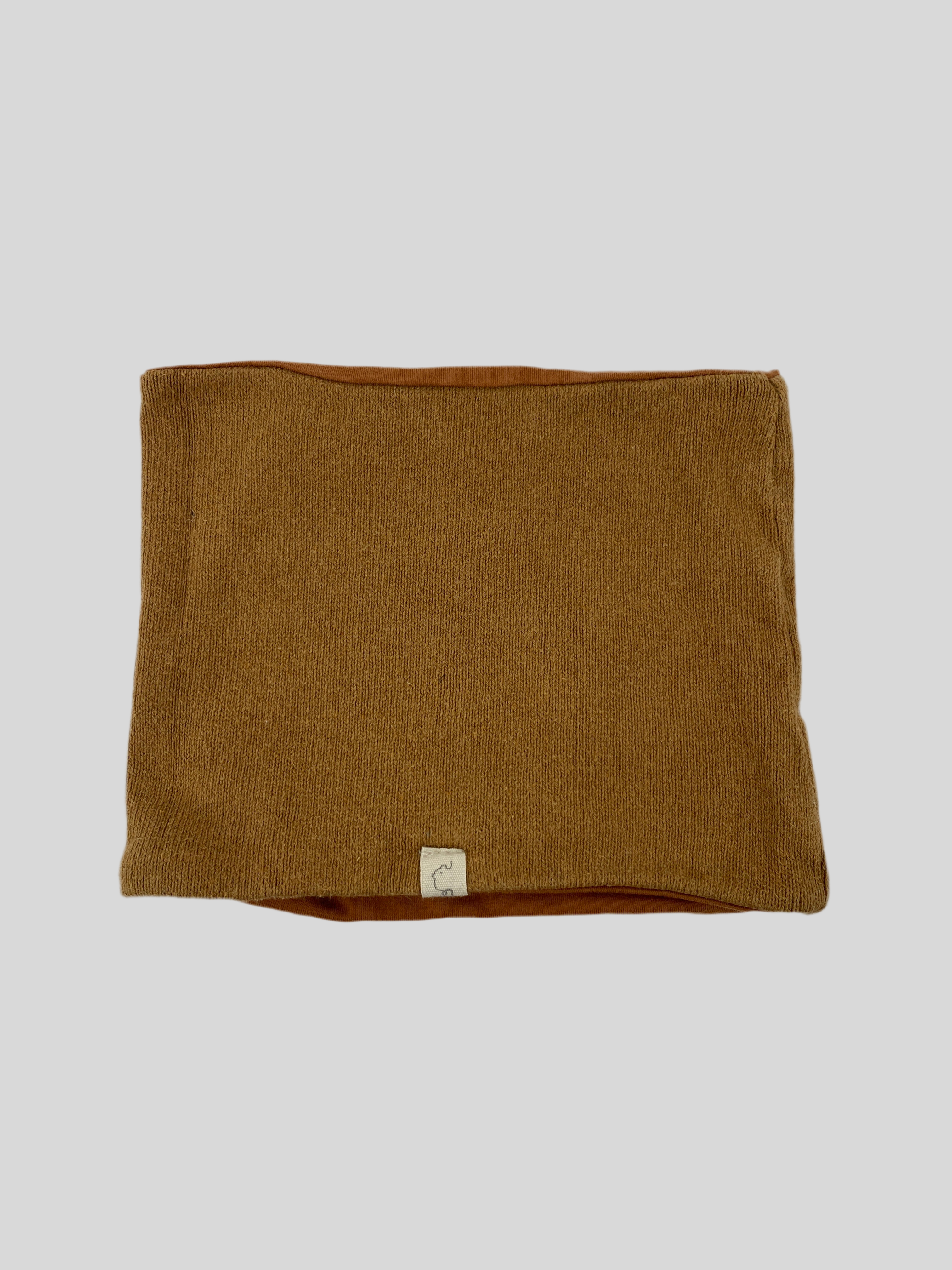 Loop Strick Sahara Gr. 2-9, ein gestricktes, braunes Musterdeckenprodukt in gutem Zustand.