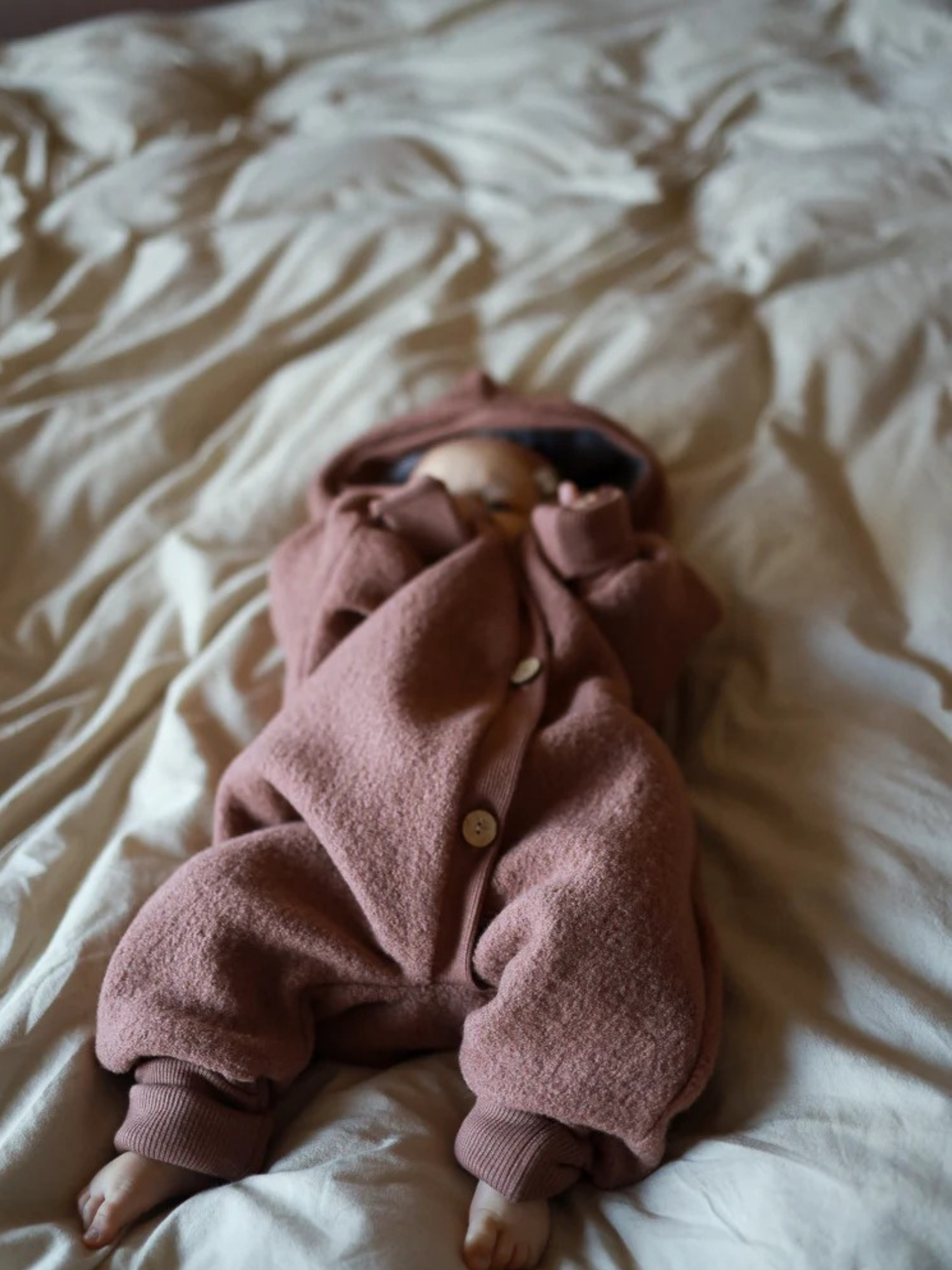 Wollwalk Anzug für Babys und Kinder in Zimt.
der perfekte Wollwalk Overall für Herbst und Winter.