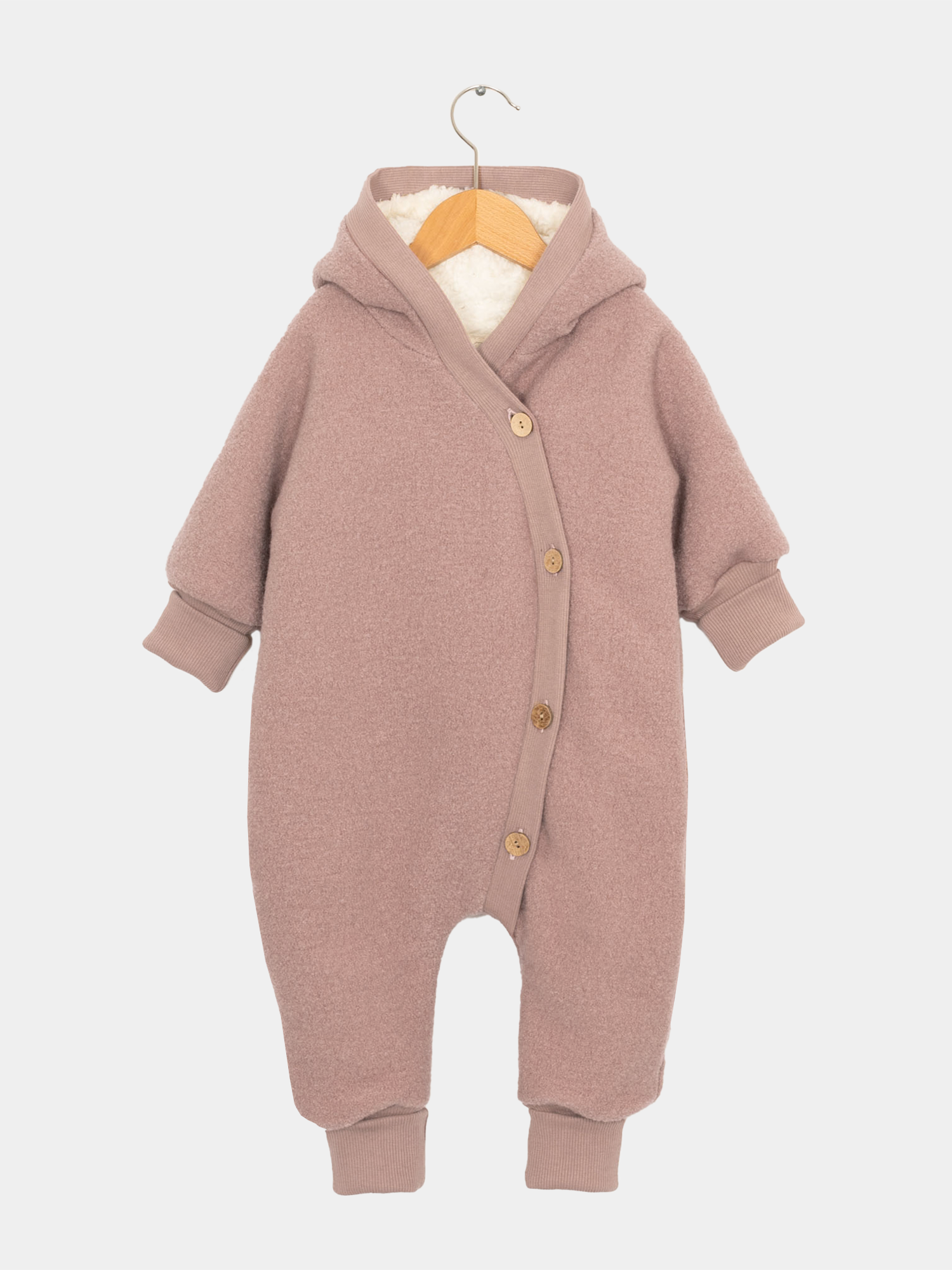 Teddy-Kuschelanzug Wollwalk - Puder: Ein rosa Babyromper mit Kapuze und Teddyfutter, ideal für kalte Tage, der perfekte Schneeanzug für Kinder.
