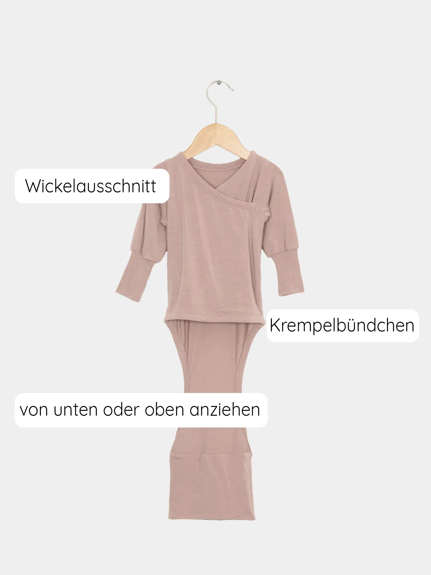 Loopbody Kaschmir-Mix - Puder: Langarmbody aus supersoftem Kaschmir-Modal-Mix, ohne Knöpfe, mit innovativem Loop-Design, das den Bauch des Babys umschließt und Wärme spendet.