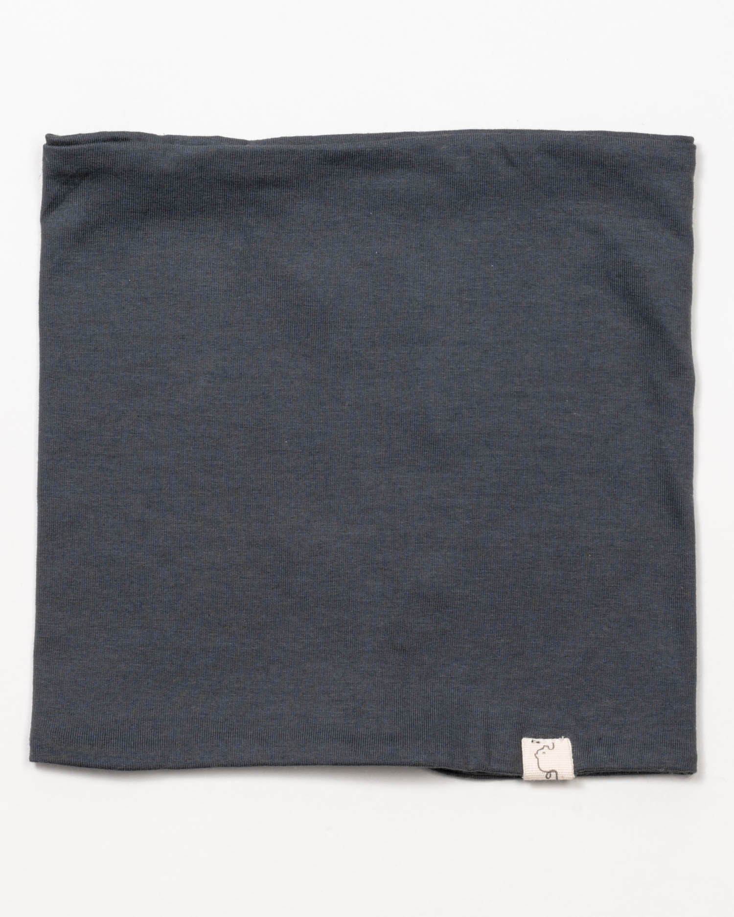 Loop Jersey Marine Gr. 6M: Ein einzelnes dunkles, röhrenförmiges Strickgewebe, flach auf weißem Hintergrund liegend, mit kleinem Stoffetikett an der Kante, Zustand: neu.