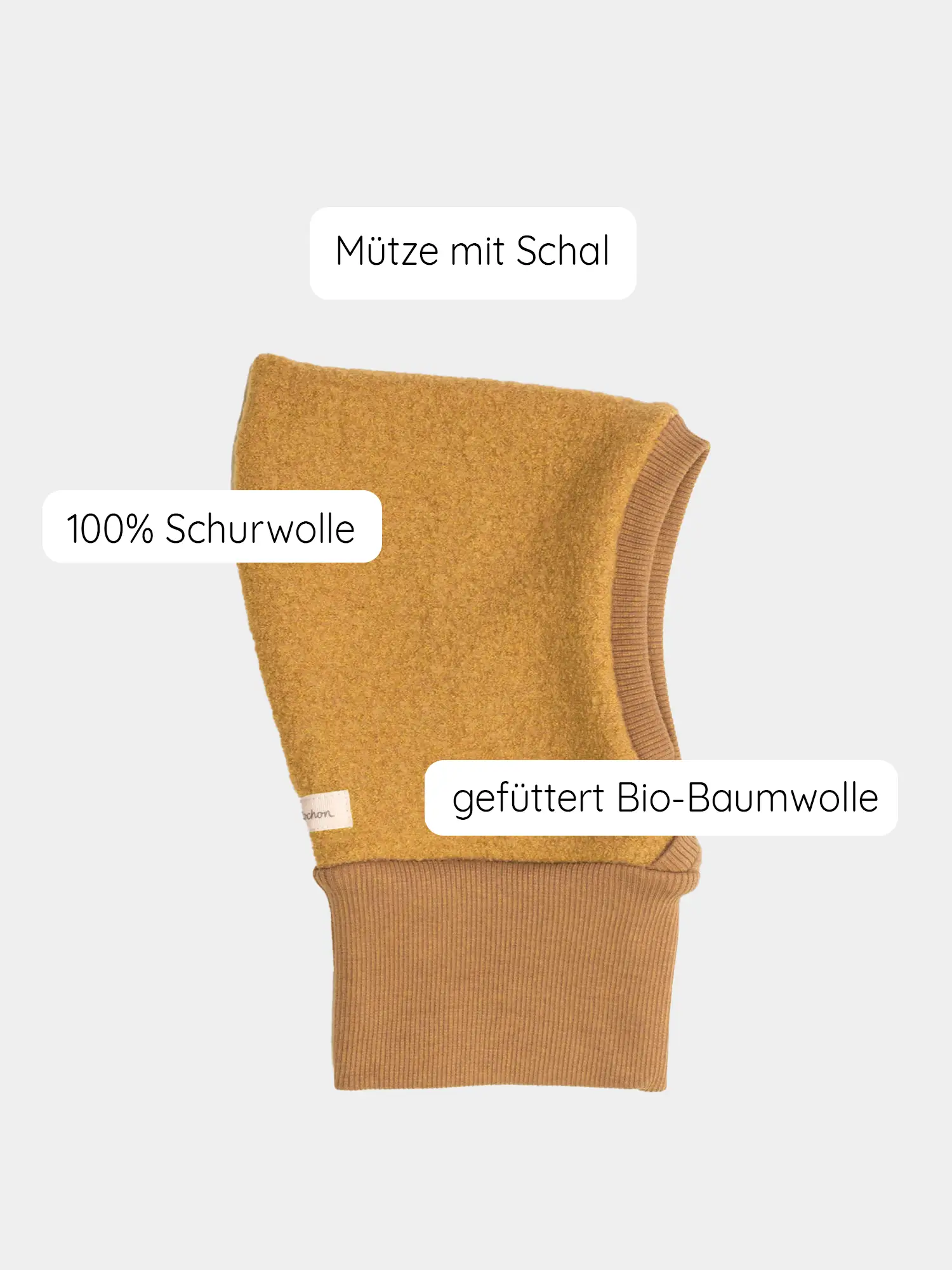 Schlupfmütze Wollwalk - Honig: Balaclava-Stil, senfgelbe Mütze mit integriertem Schal, aus 100% Schurwolle, innen mit Bio-Baumwolle gefüttert, für optimalen Schutz von Kopf bis Hals.