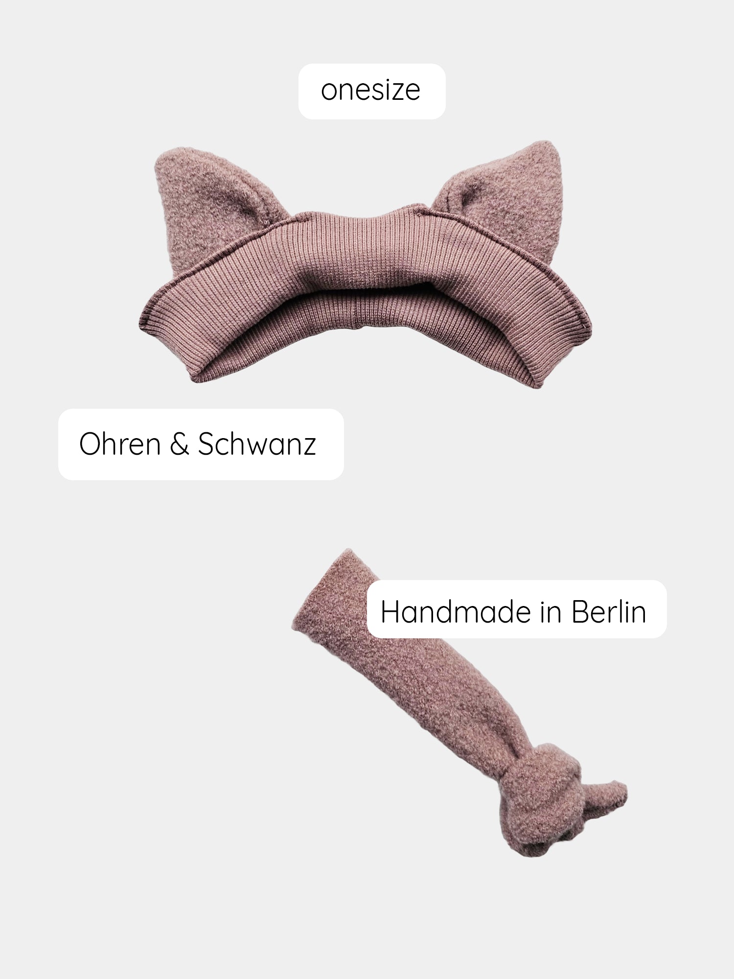 Verkleidungs Haarband + Schwänzchen Rosé, Nahaufnahme eines eleganten Haarbands mit Schleife, ideal für Kostüme. Anzug nicht inbegriffen, sichere Befestigung mit Sicherheitsnadeln empfohlen. Zustand: neu.