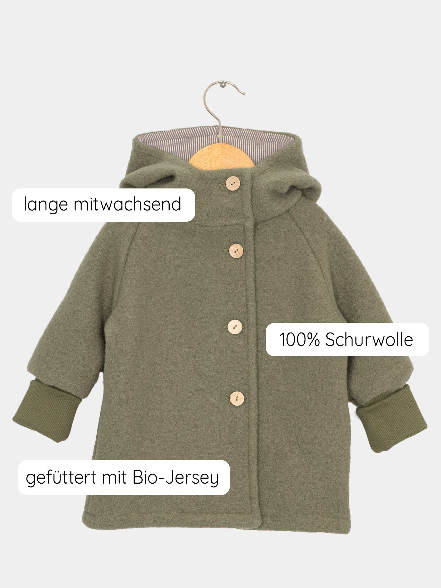 Wichteljacke Wollwalk - Pistazie auf einem Kleiderbügel, mit krempelbaren Bündchen und Knöpfen, bietet Bewegungsfreiheit und Temperaturregulierung, ideal für Kinder in Herbst, Winter und Frühling. nachhaltige Kinderkleidung aus Wollwalk
