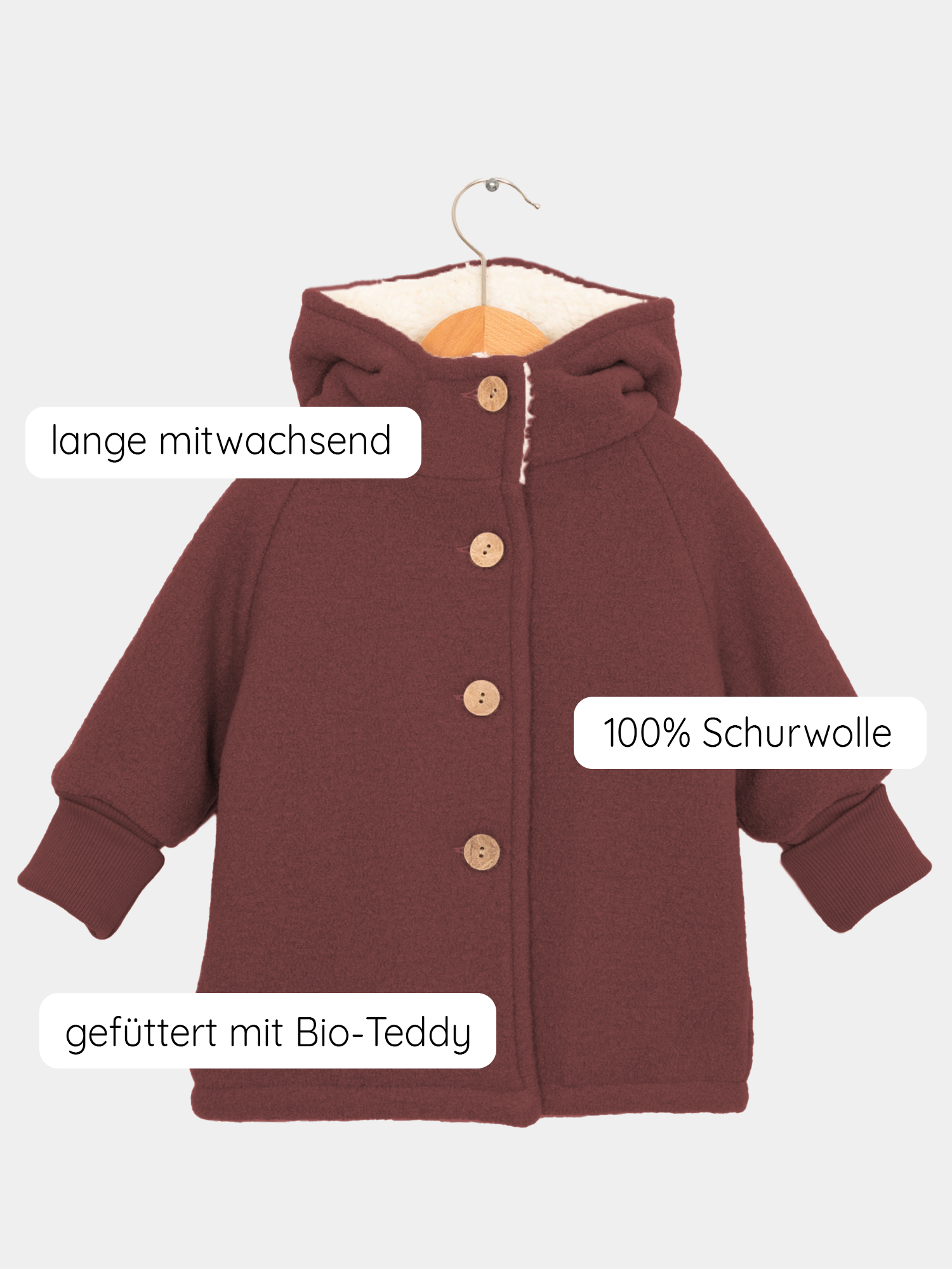 Teddy-Wichteljacke Wollwalk - Ziegel: Kinderjacke aus Wollwalk mit spitzer Kapuze, vier Holzknöpfen und weichem Bio-Teddyfutter. Mitwachsende Bündchen bieten Flexibilität, ideal für kalte Tage. Fair hergestellt in Berlin.