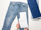 Nähanleitung Recyclingjeans: Schritt-für-Schritt-Anleitung zur Herstellung einer Mitwachshose aus einer alten Erwachsenen-Jeans für Kinder.