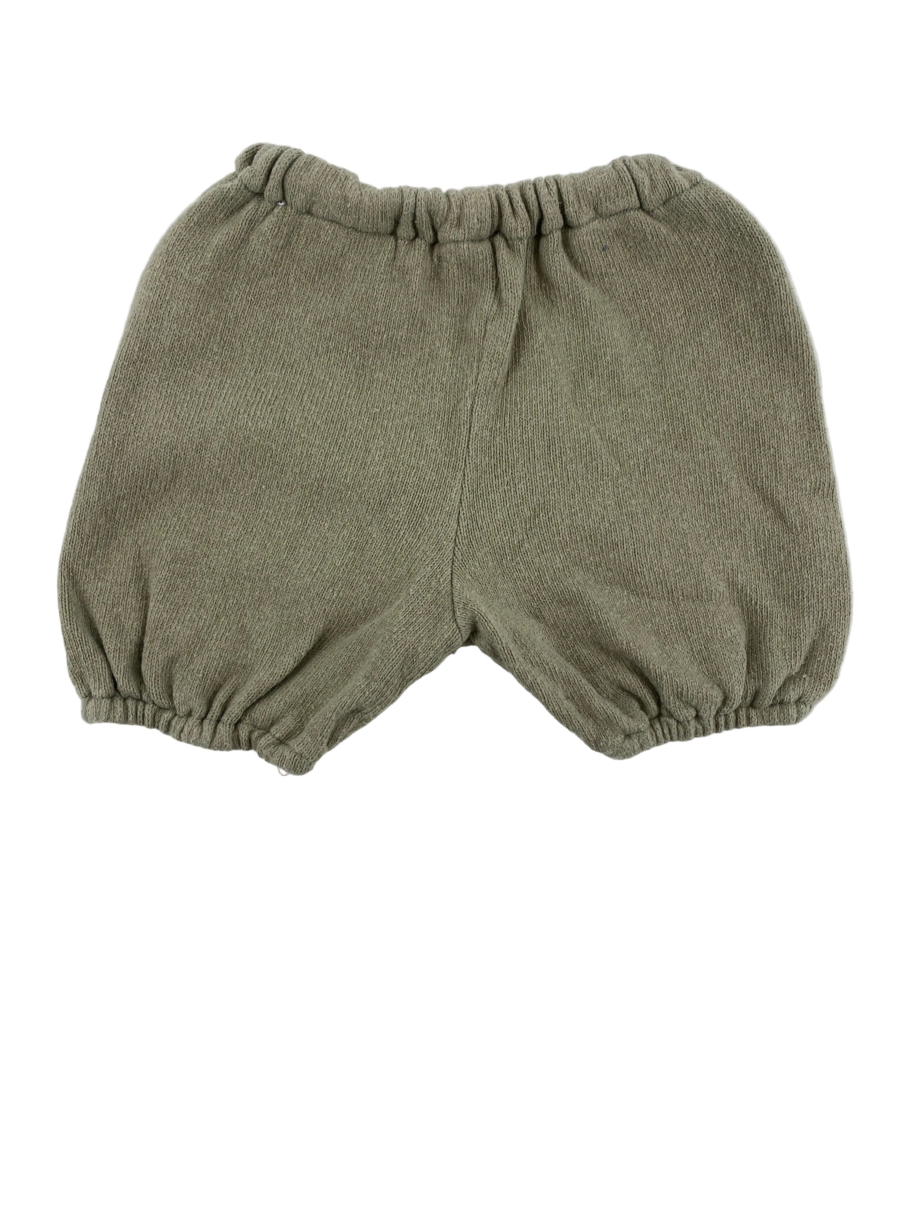 Pumphose Strick Salbei Gr 1Y: Diese gestrickten Baby-Bloomers haben einen elastischen Bund und Beinöffnungen, die Komfort bieten. Zustand: gut. Ideal für Kleinkinder, die bequeme und stilvolle Kleidung benötigen.