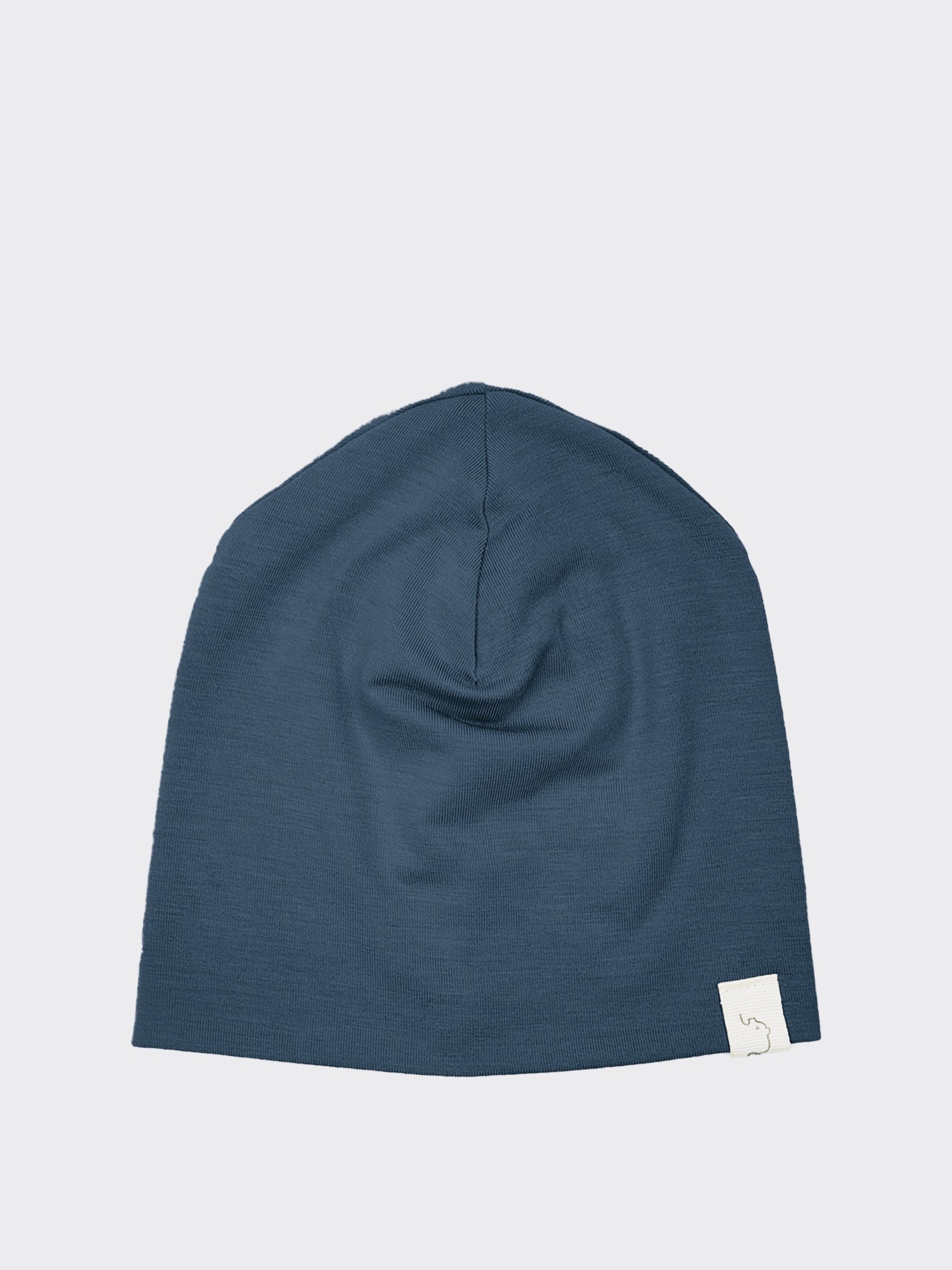 Beanie Kaschmir-Mix - Blaubeere: Schlichte, slouch-style Mütze aus feinem Jersey-Material, mit kleinem weißen Stoffetikett am Rand, ideal für empfindliche Babyhaut.