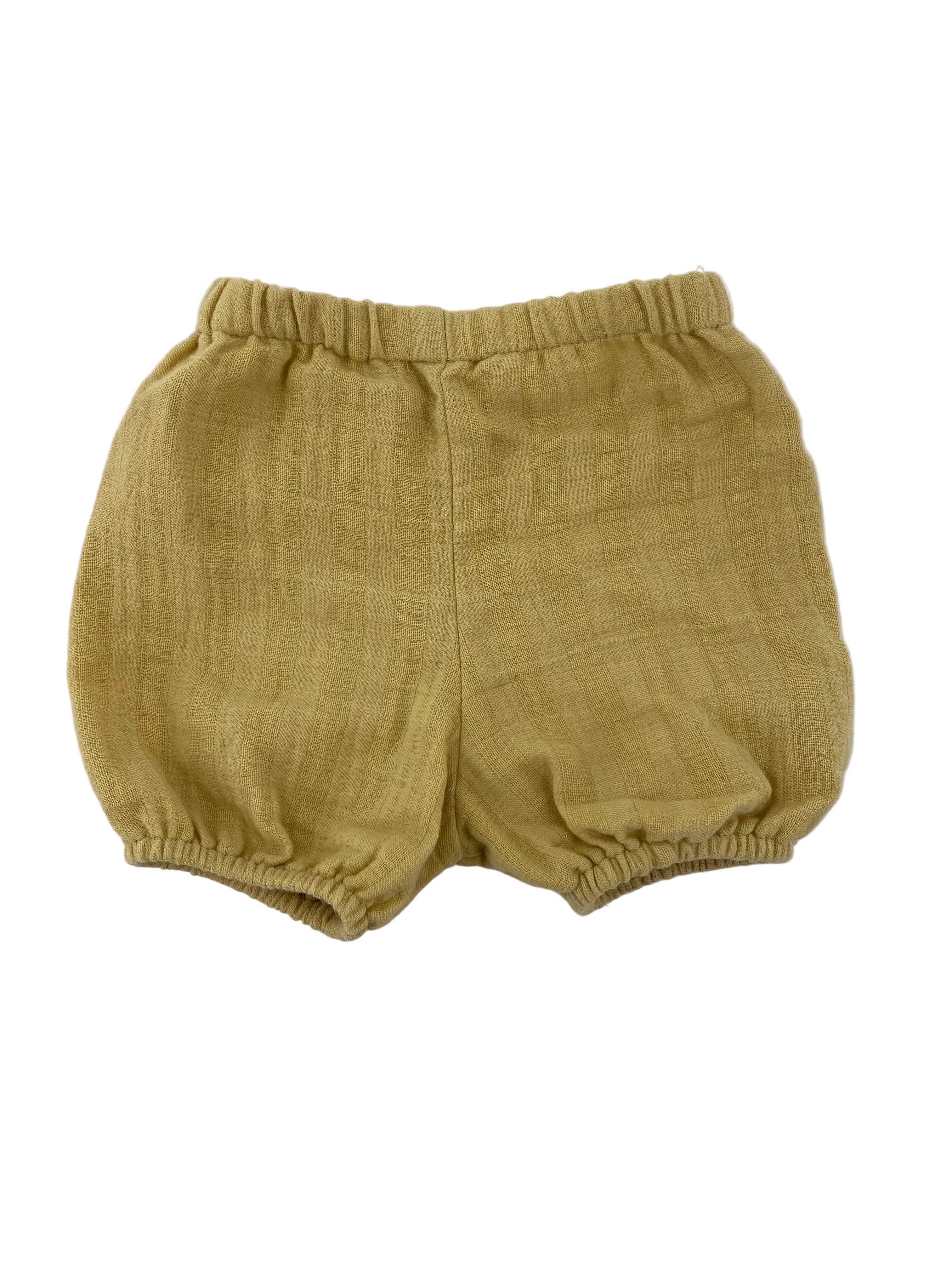 (Kopie) Pumphose Musselin Vanille Gr 3M zeigt eine einzelne, muskatgelbe Babybloomers mit elastischem Bund und Beinabschlüssen, Zustand: sehr gut, wie neu.