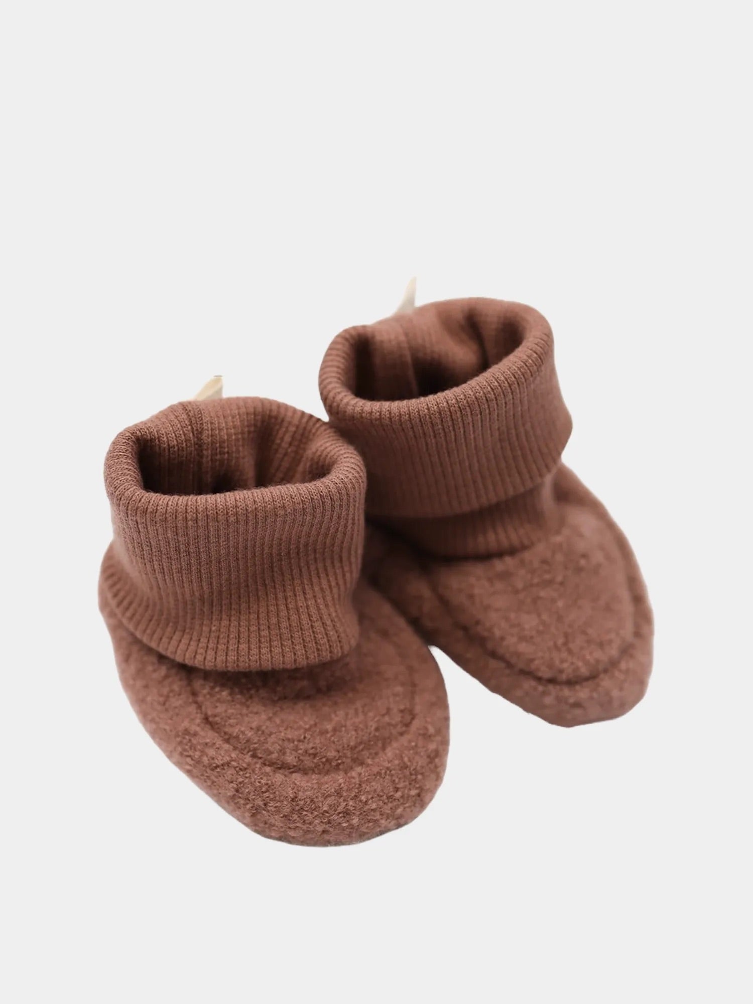 Babybooties Wollwalk Nougat Gr. 6M, neu, zeigen weiche, warme Schühchen für Babys, ideal für kalte Tage. Perfekt verarbeitet, bieten sie Komfort und Schutz für empfindliche Babyfüße.