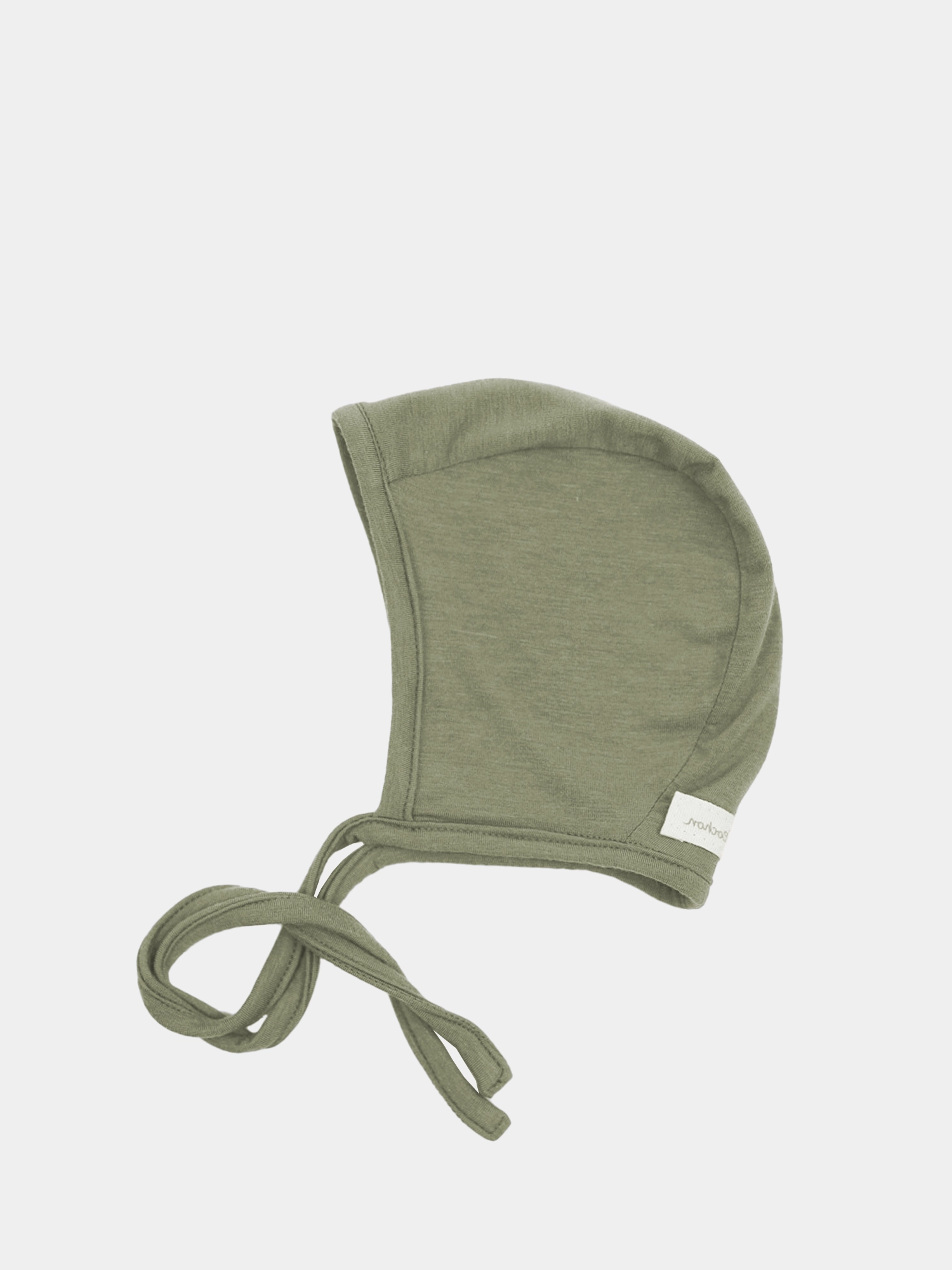 Babyhäubchen Kaschmir-Mix - Pistazie, ein weiches, olivgrünes Strickhäubchen mit langen Bindebändern aus elastischem Micromodal-Kaschmirstoff, bietet Wärme und Schutz für empfindliche Babyköpfe.