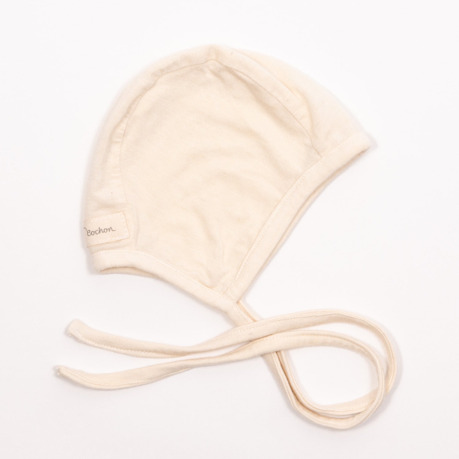 Babyhäubchen Kaschmir-Mix Natur Gr. 2, neu, zeigt feine Strickdetails und eine weiche Textur, ideal für zarte Babyhaut. Perfekte Passform für Komfort und Wärme.