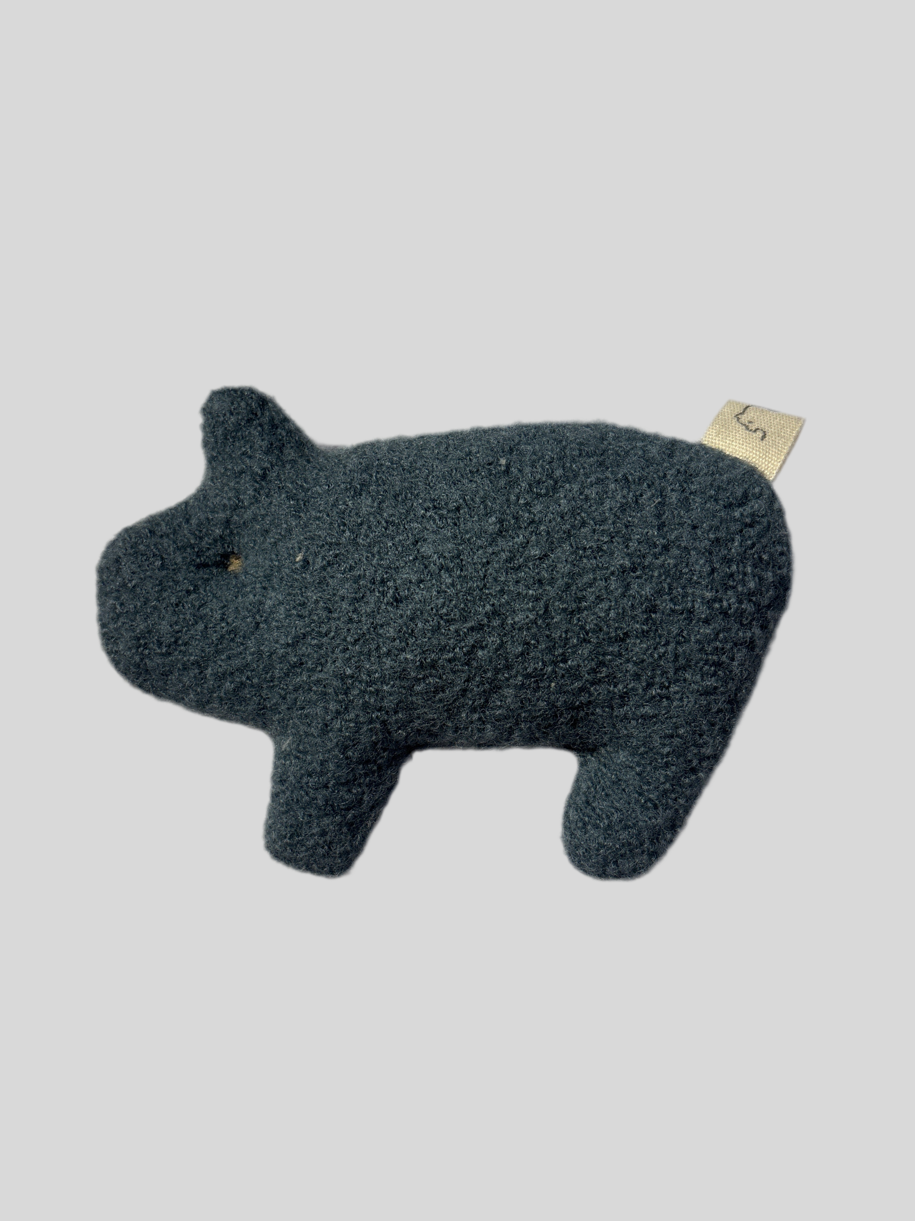 Kleines Wollwalk Schweinchen aus 100% Schurwolle - Taube, handgefertigtes Minikuscheltier aus Wollwalkresten, ca. 10 cm lang. Perfekt als kleines Geschenk, mit liebevollen Details gestaltet.