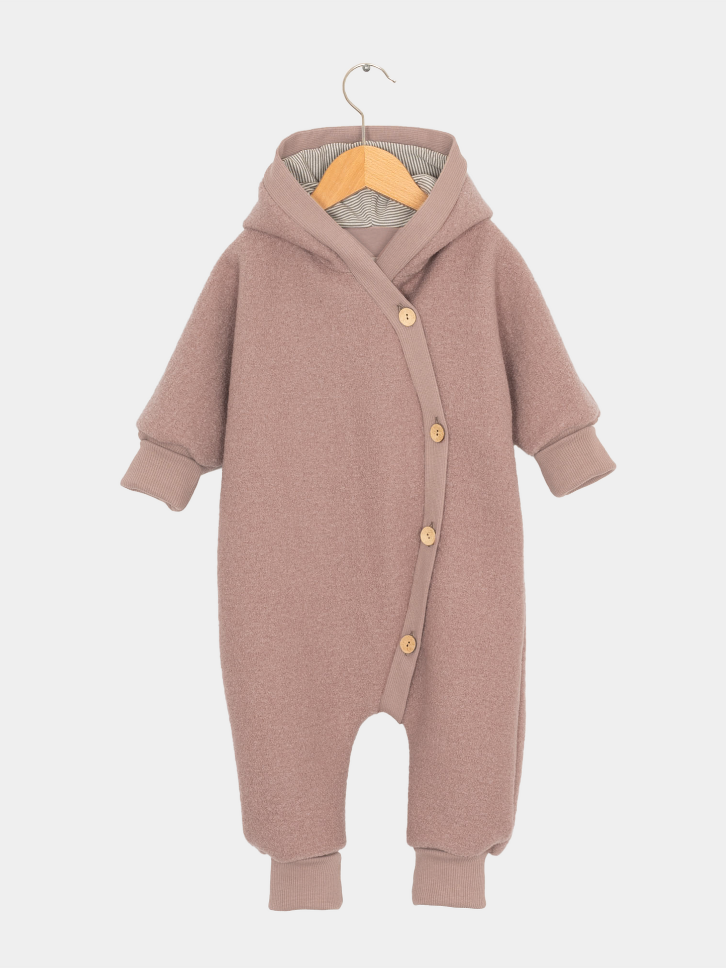 Kuschelanzug Wollwalk - Puder, ideal für kühle Jahreszeiten durch wärmende und atmungsaktive Eigenschaften. 
Wollwalkoverall für Kinder und Babys.