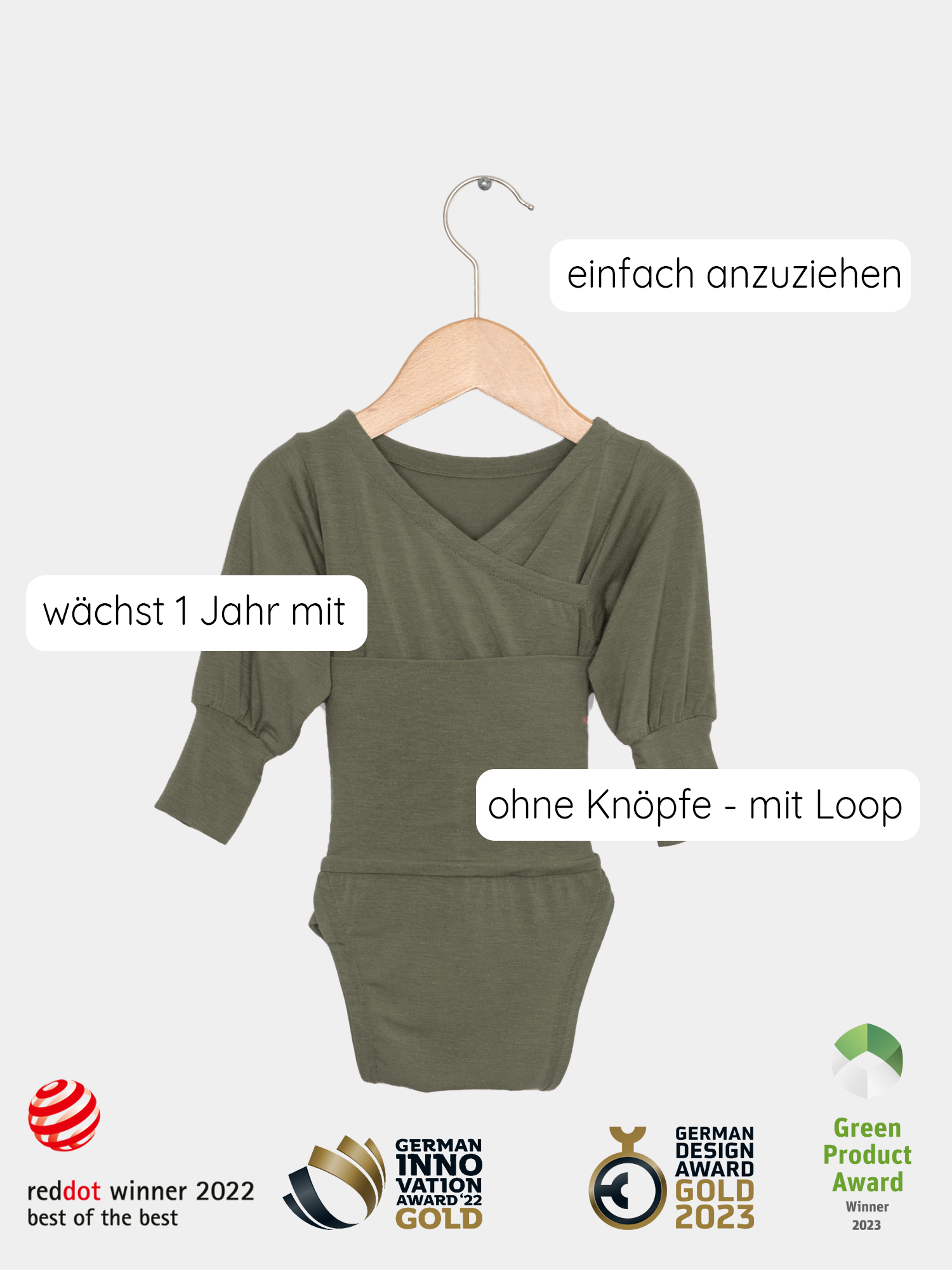 Loopbody Kaschmir-Mix - Avocado: Ein grüner Babybody auf einem Schaukelstuhl, aus weichem Modal-Kaschmir-Mix, ohne Knöpfe, mit einzigartigem, preisgekröntem Design. Baby Body für Erstausstattung Baby.