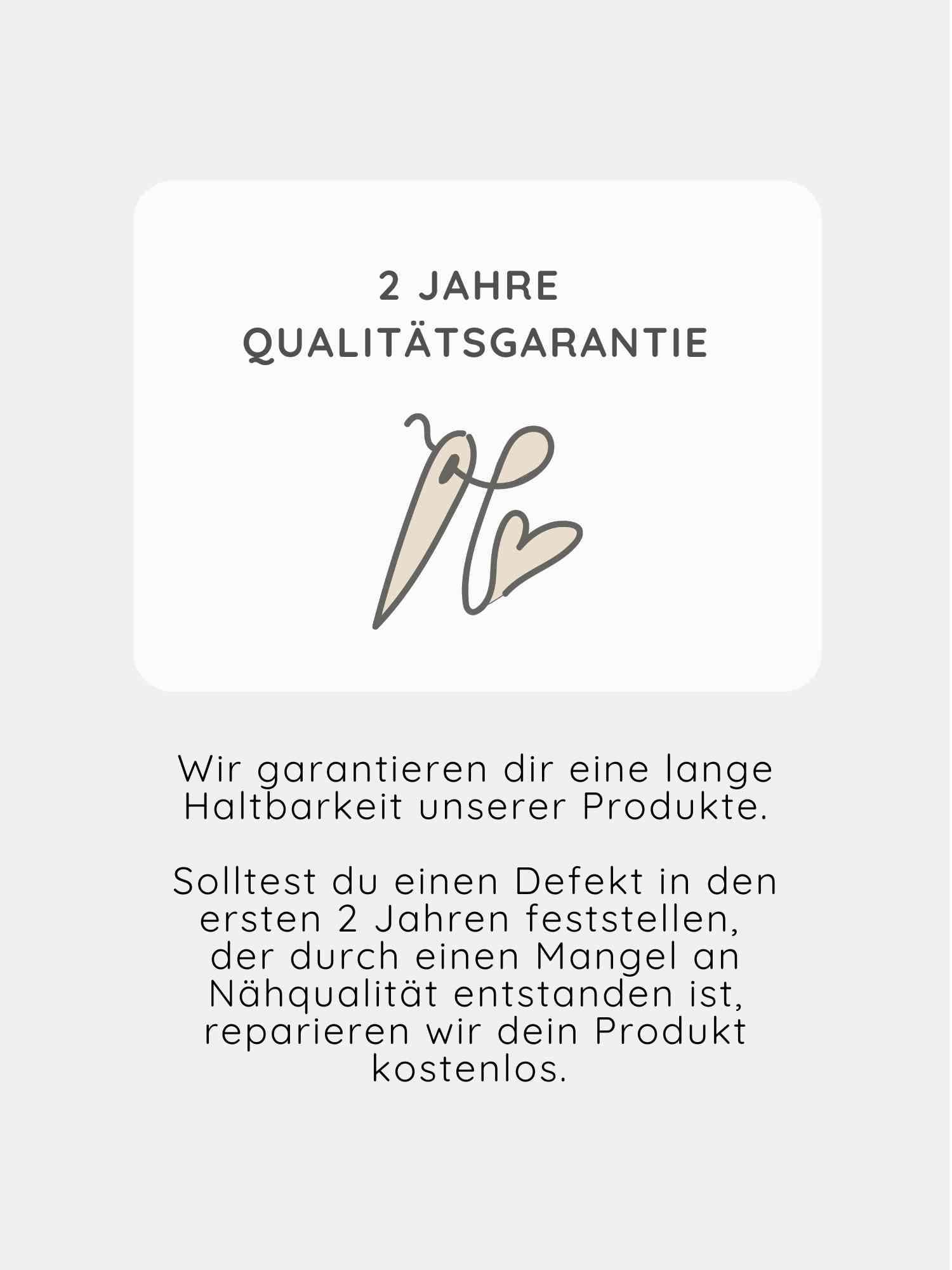 Loopbody Bambusviskose - Cremepuder mit 2-Jahre Qualitätsgarantie-Badge, stilisierte Nähnadel mit herzförmigem Faden. Hinweis auf kostenlose Reparatur bei Nähmängeln in den ersten zwei Jahren.