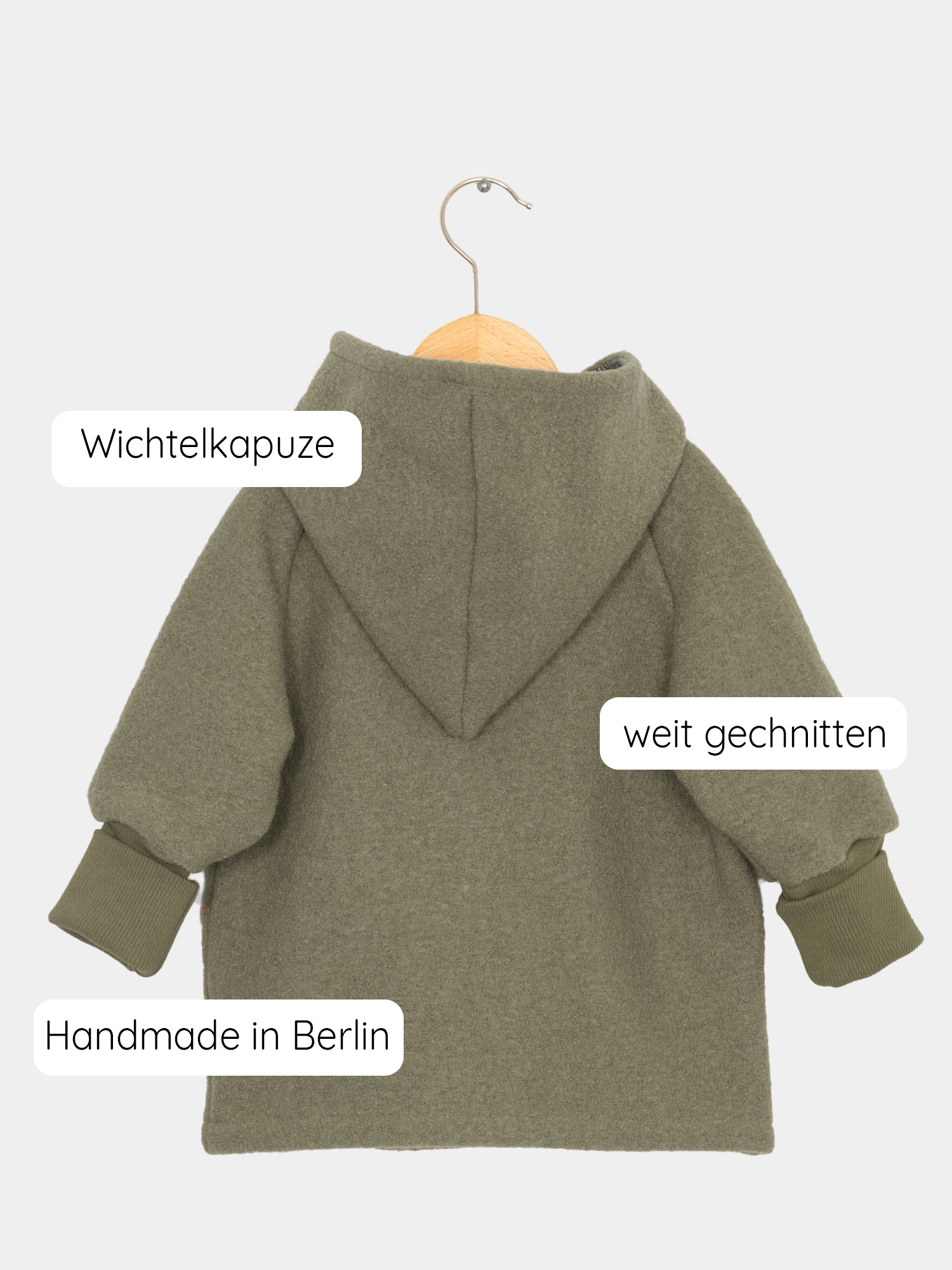 Wichteljacke Wollwalk - Pistazie mit Kapuze, aus hochwertigem Wollwalk und gefüttert mit Bio-Baumwoll-Jersey, bietet Bewegungsfreiheit und temperaturregulierende Eigenschaften, ideal für Herbst, Frühling und Winter. nachhaltige Kinderkleidung aus Wollwalk