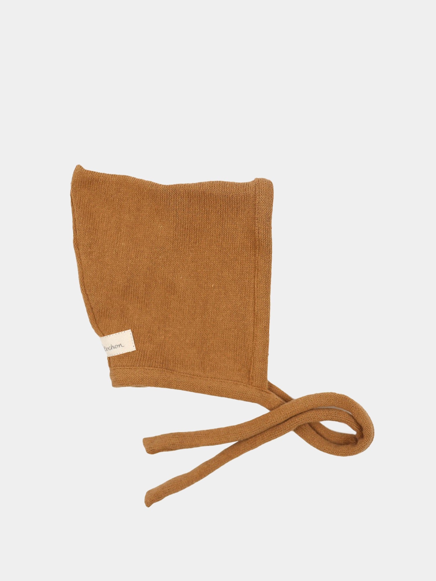 Zwergenmütze Strick Sahara Gr. 0M: Nahaufnahme einer gestrickten Mütze mit feinen Details und einem praktischen Band, ideal für Neugeborene, in makellosem Zustand.