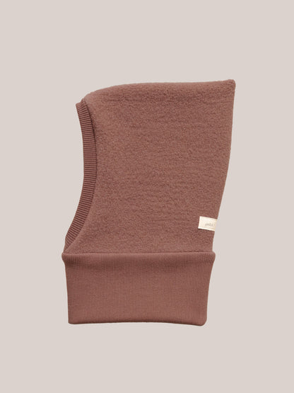 petit cochon Schlupfmütze aus altrosa Wollwalk mit weichem Bio-Jersey-Futter für Kinder