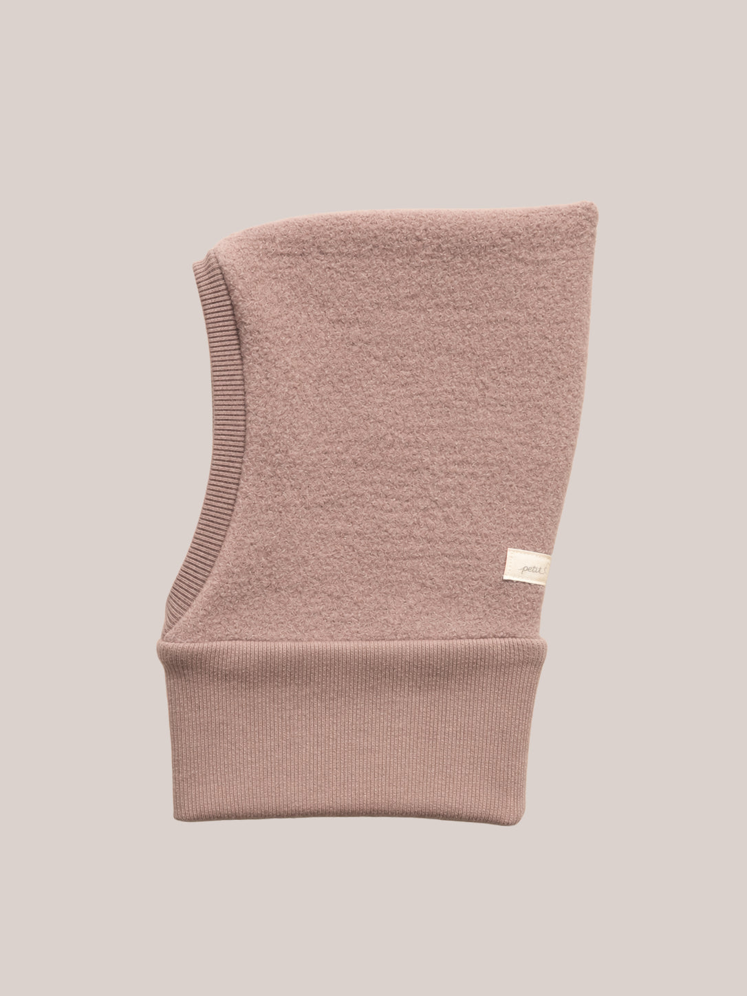 petit cochon Schlupfmütze aus altrosa Wollwalk mit weichem Bio-Jersey-Futter für Kinder