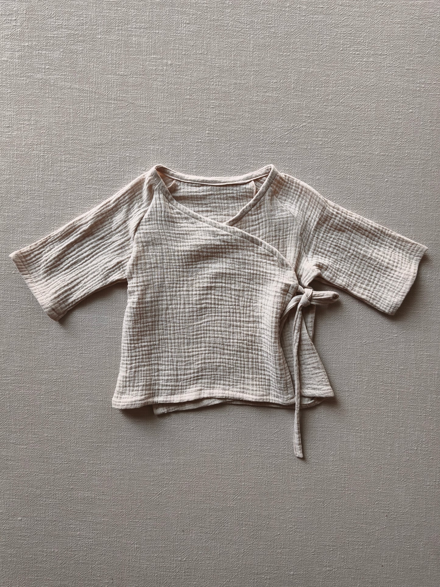 Muslin wrap top sand, size 1Y