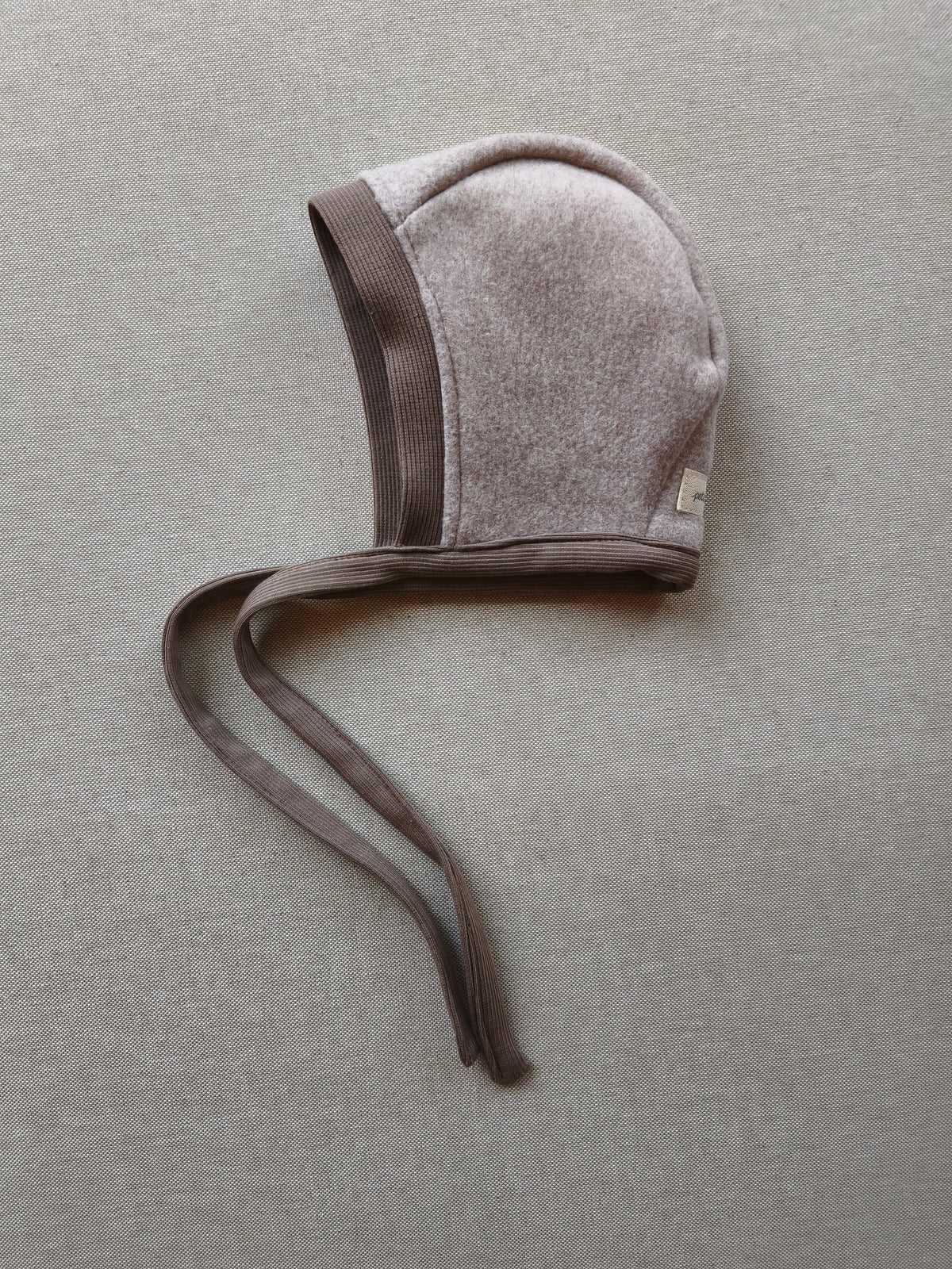 Babyhäubchen Baumwoll Fleece Hafer meliert Gr 0M-6M