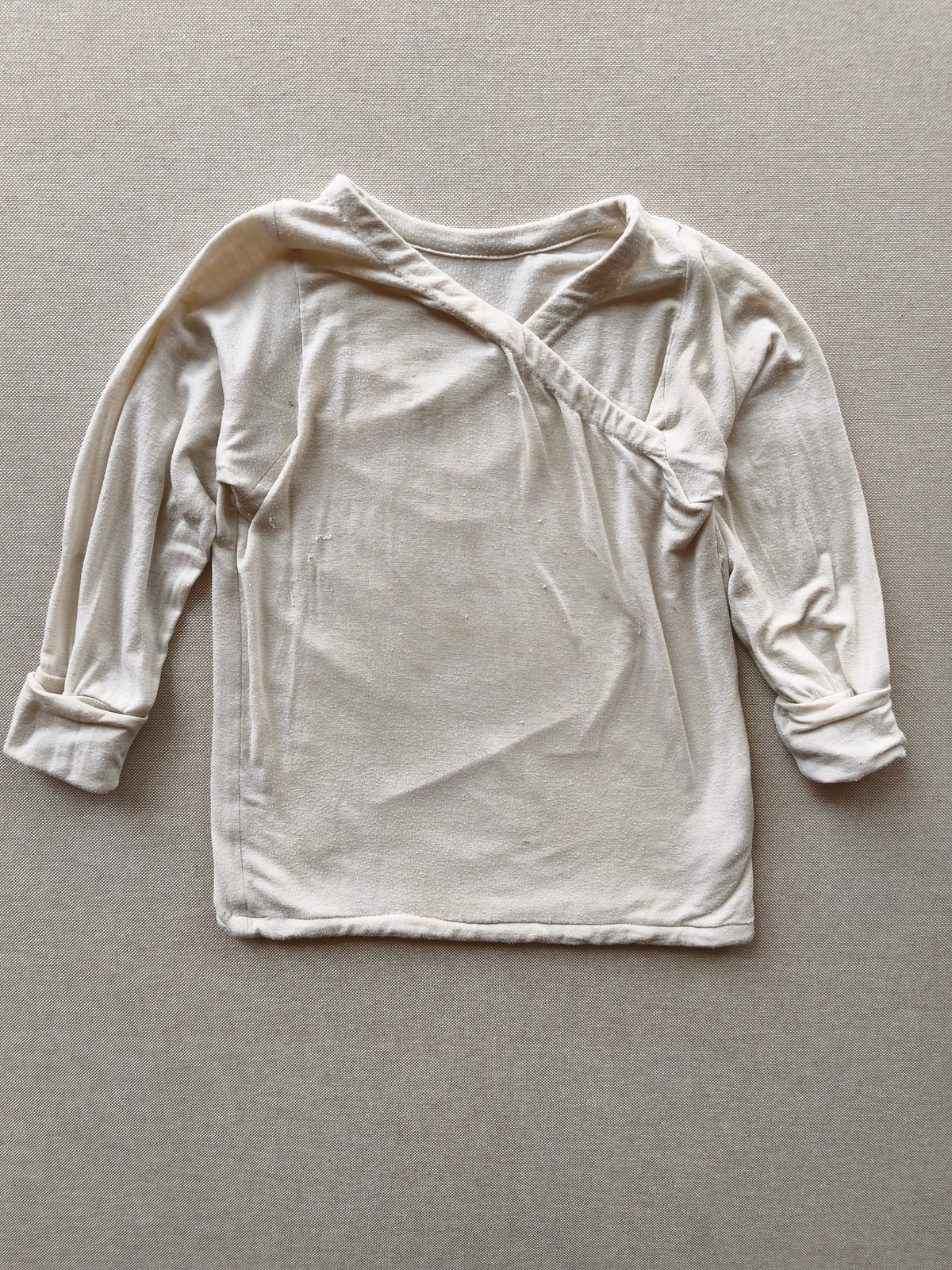 Wickelshirt Kaschmir Mix Natur Gr 2Y / Fadenzieher